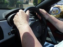 Graham White driving his car