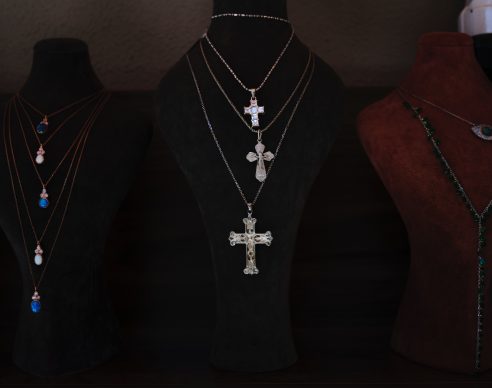 Christian factory worker wins religious discrimination claim after being fired for refusing to take off crucifix necklace Christian factory worker wins religious discrimination claim after being fired for refusing to take off crucifix necklace